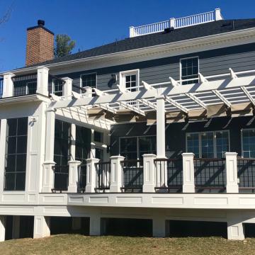 Open air porch with pergola, railings, and screened section